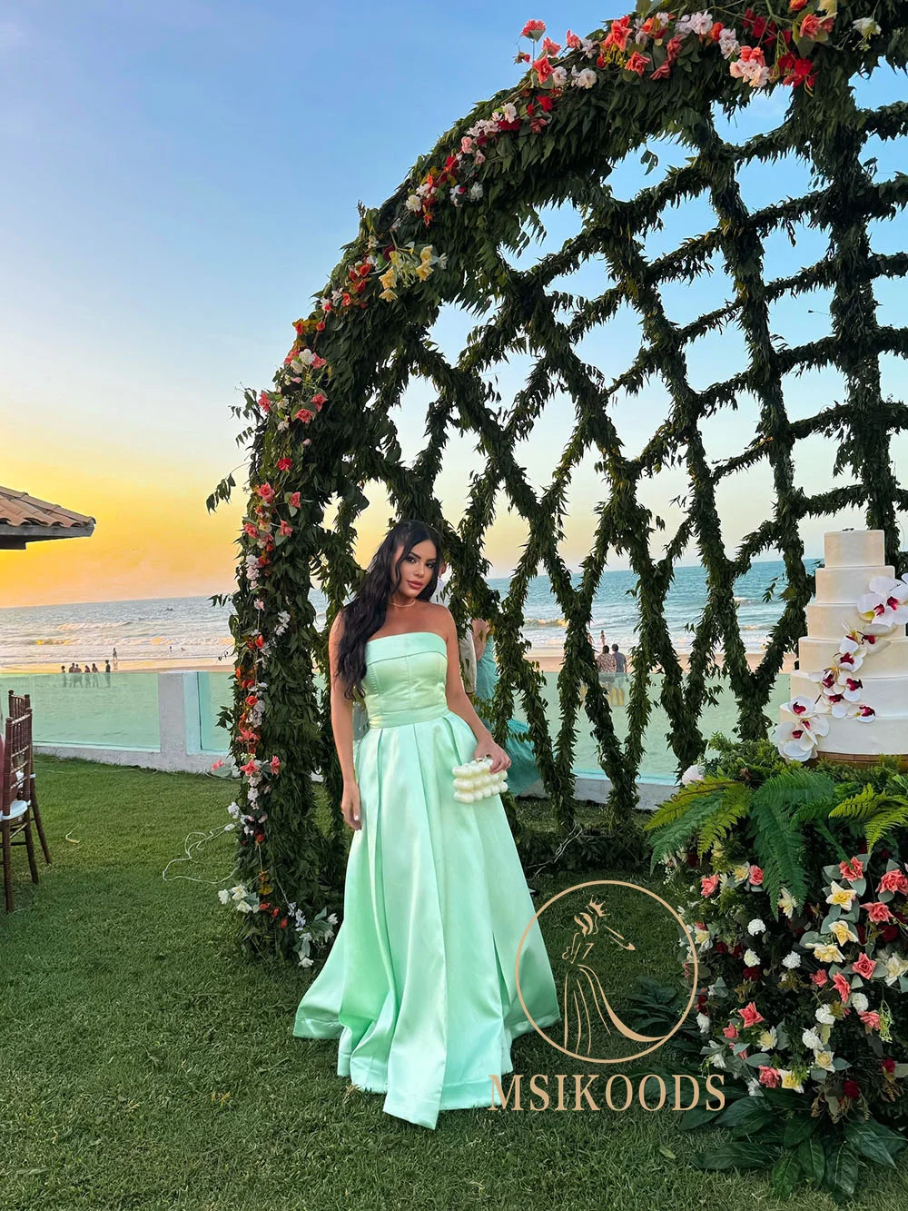 فستان سهرة ستان اخضر 2025