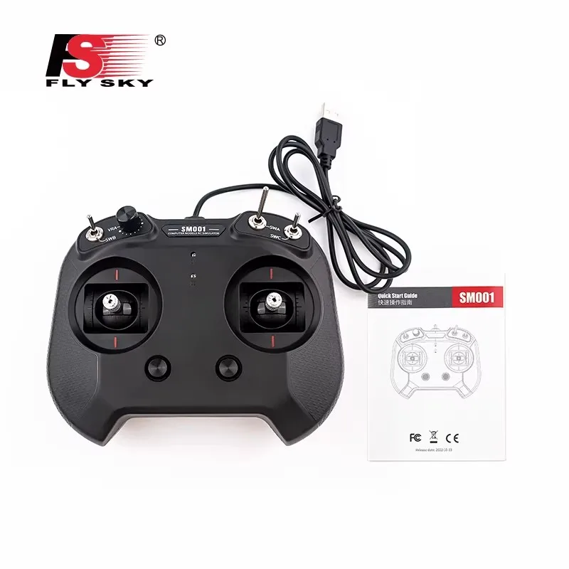 Simulateur de vol RC Flysky FS-SM001 8 canaux posé sur un bureau avec un casque de réalité virtuelle