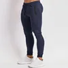 2024 cross-border spring and summer new solid color fitness trousers casual elastic men 2