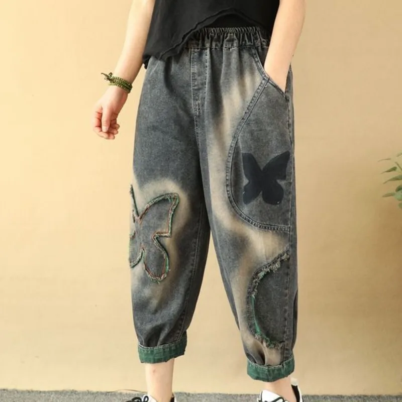 

2024 Summer New Retro Ethnic Style Printed Distressed Tassel Women's Loose Large Size Pockets Spliced Curled Harlan Denim Pants