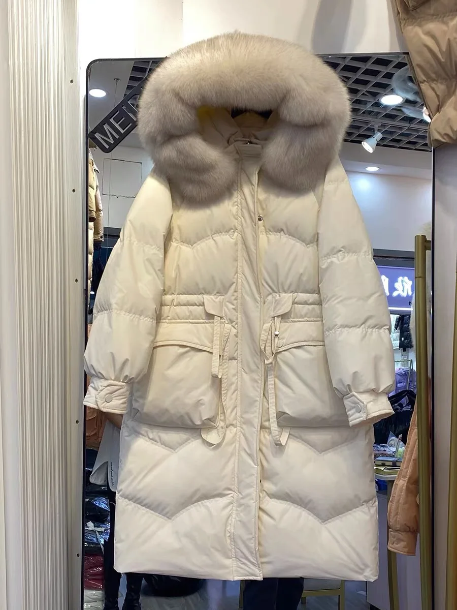 Рисунок 2 - Женский длинный пуховик на белом утином пуху