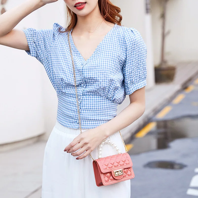 Women's 2023 Ladies Handbag New Pearl Hand Chain Mini Jelly Bag Leisure Mouth Red Bag