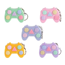 Tiktok – Mini manette de jeu portable lumineuse, nouveau Design, Puzzle musical, décompression, porte clés, pendentif, jouets cadeaux 