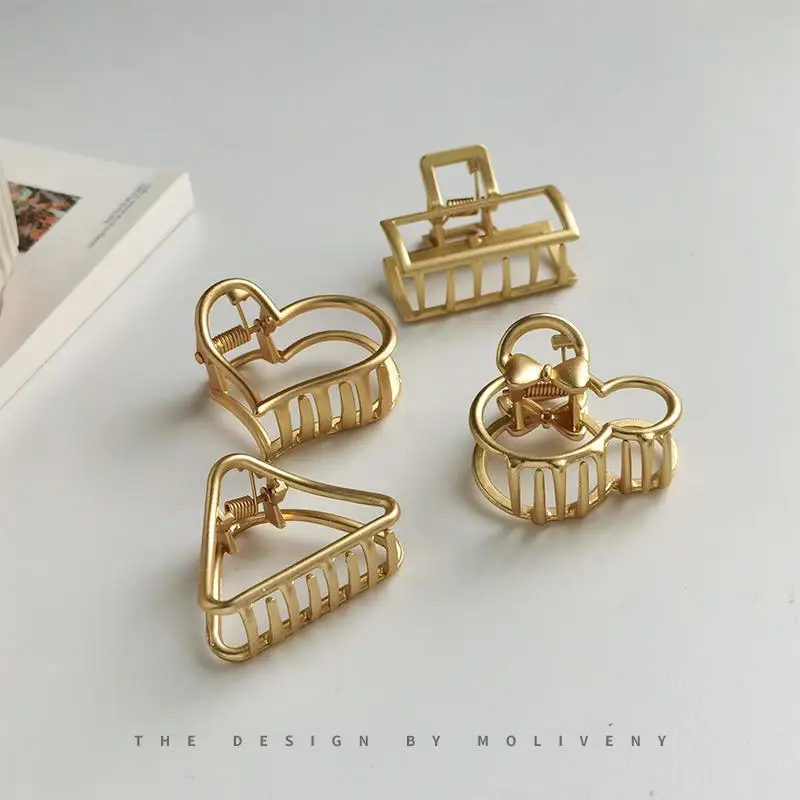 Fermagli per capelli in metallo a cuore cavo alla moda Semplice antiscivolo Mini Frangetta geometrica dorata Barrette per capelli Mascelle per donne Ragazze ogni giorno_voghion.com