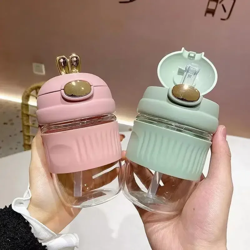 https://ae01.alicdn.com/kf/S816b0ebf3f104a9c9b3ee2b6a0b491b7W/Water-Bottle-for-Girl-500ml-Kawaii-with-Straw-Cute-Rabbit-Ear-Fashion-Summer-Plastic-Student-Portable.jpg