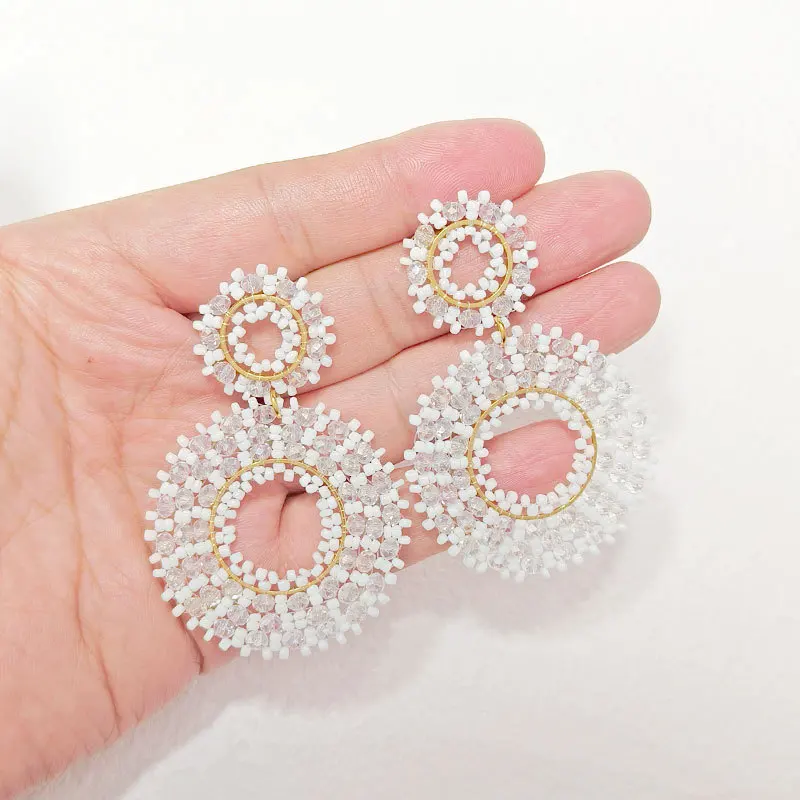 

Beaded earrings Roundness Hollow out Originality Crystal Geometry Bohemia Hand knitting Alloy Tide Simple Rice bead earrings