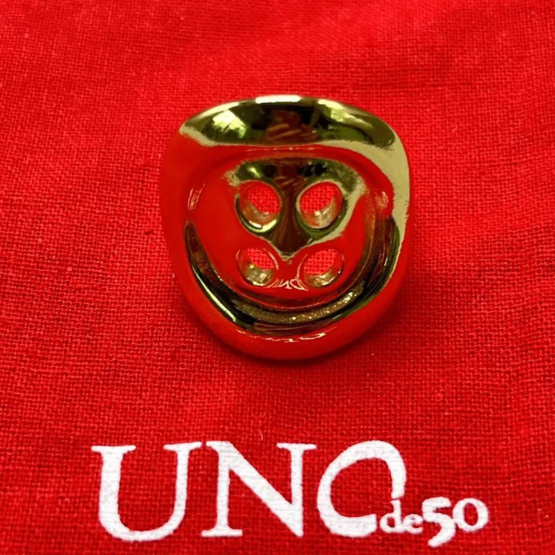 

2023 UNode50 best-selling European and American fashion exquisite women's button ring romantic holiday jewelry gift bag with