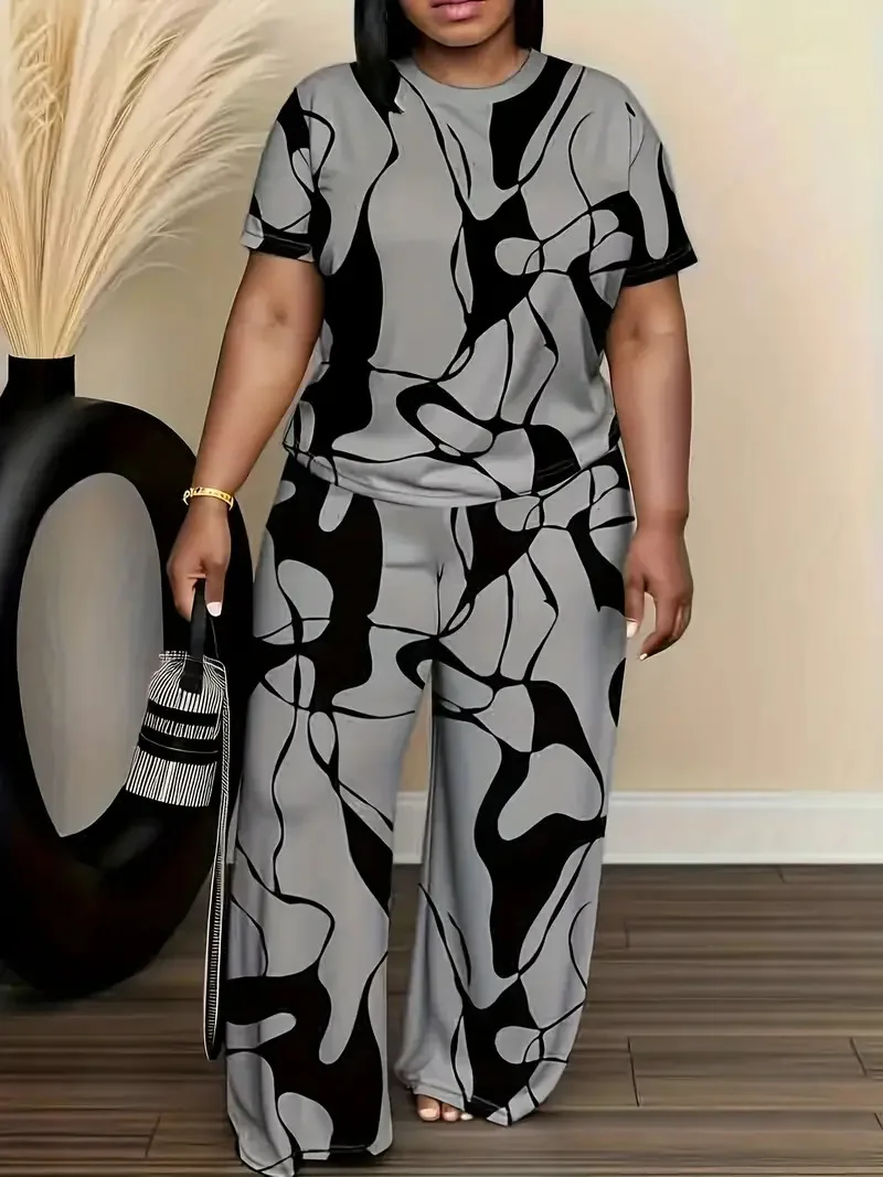 Women's summer fashion print two-piece outfit with round-neck short sleeve T-shirt and wide-leg trousers in a relaxed fit. 02