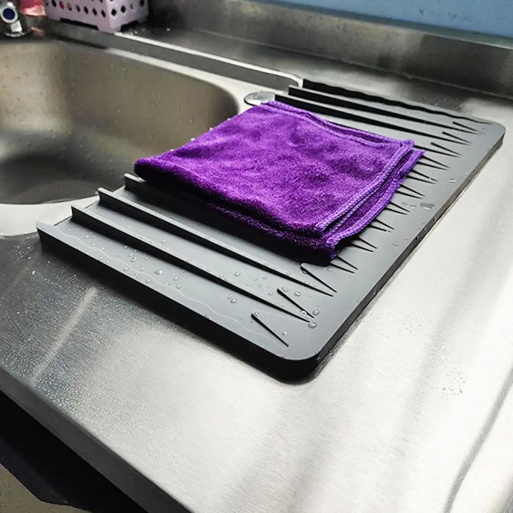 https://ae01.alicdn.com/kf/S81999c122d5b48c3bf03617b92db07233/S-L-New-Drain-Mat-Solid-Silicone-Dish-Drainer-Tray-Large-Sink-Drying-Worktop-Organizer-Drying.jpg