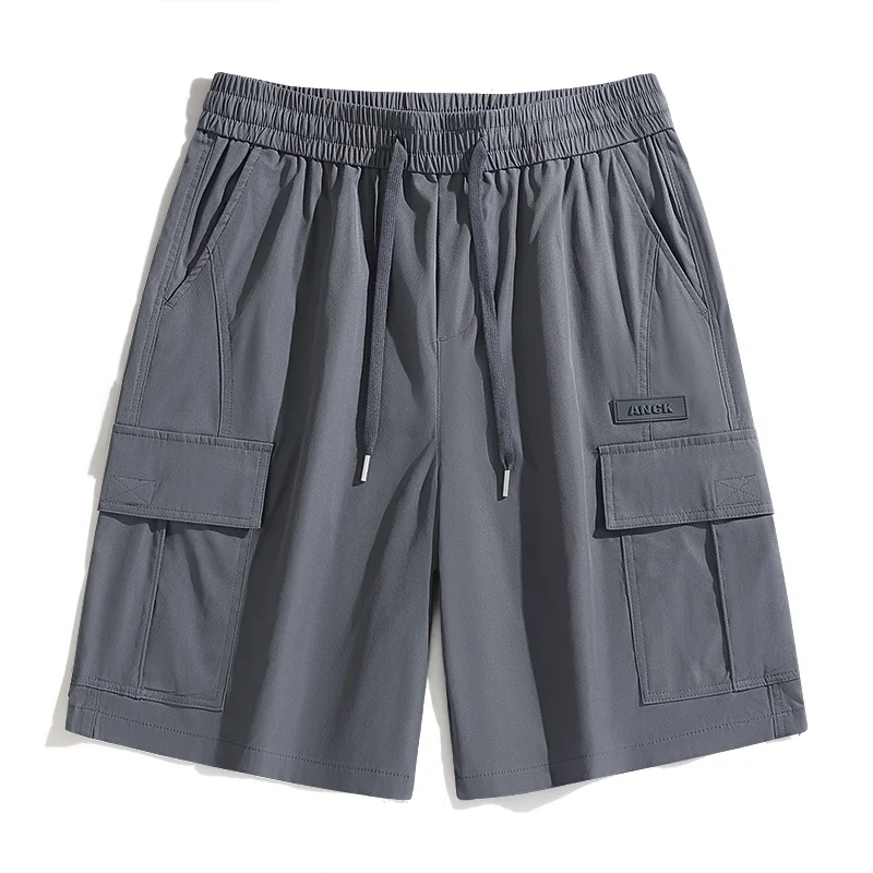 Fashion Elastic Spliced Pockets Straight Casual Shorts Men's Clothing 2024 Summer New Loose Solid Color High Waist Knee Shorts
