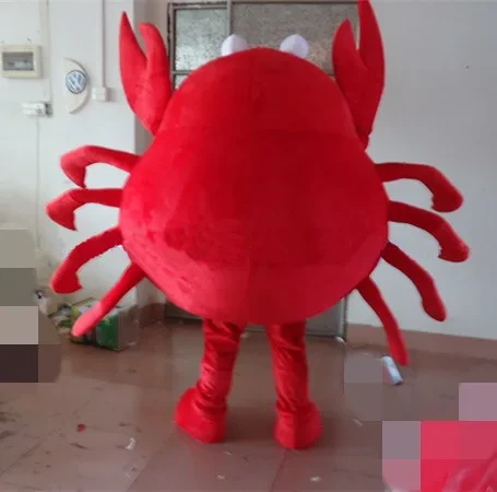 Personaje de disfraz de mascota de cangrejo ermitaño rojo vestido con una  falda plisada y anteojos