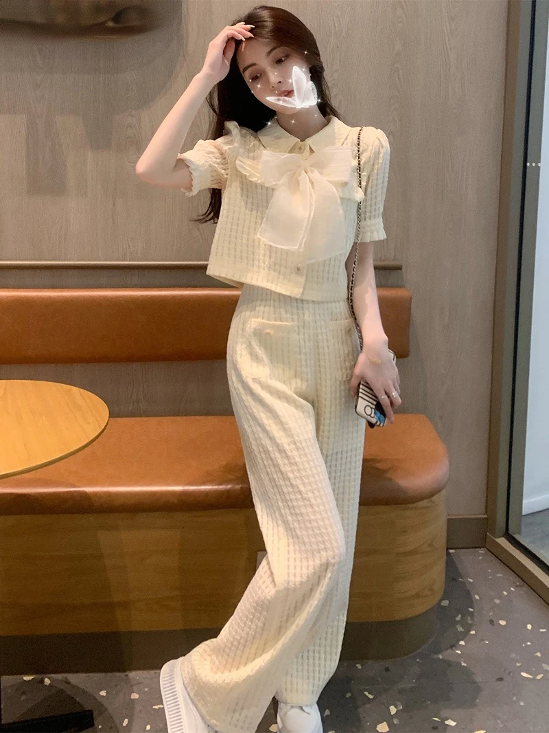 

Sweet Summer Two Piece Set Women Pearl Bowknot Puff Short Sleeve Lapel Shirt + Wide Leg Pants Sets High Quality Fashion Outfits