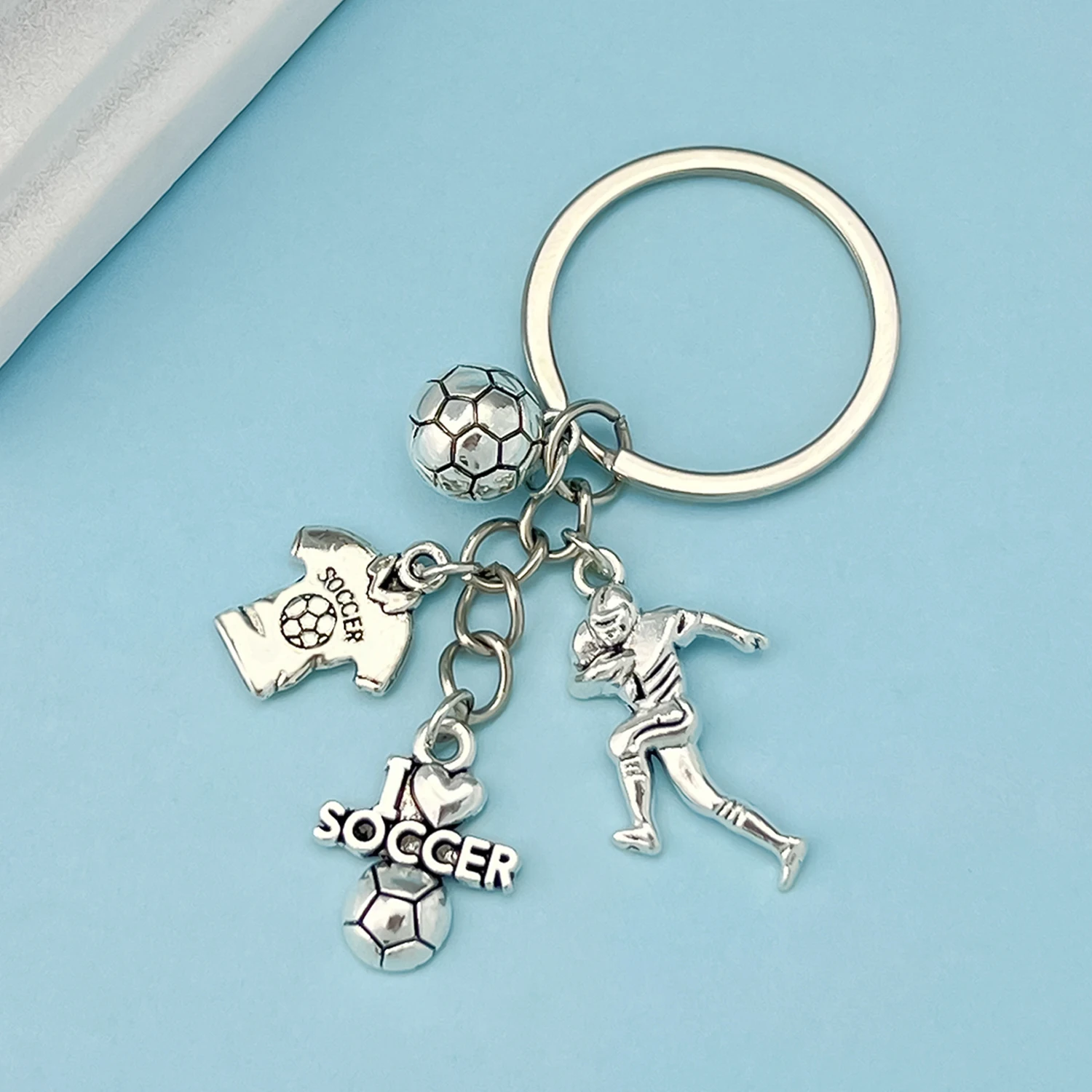سلسلة مفاتيح معدنية لكرة القدم للرجال والنساء ، حلقة مفاتيح معدنية ، حقيبة محفظة ، حقيبة ظهر ، سحر السيارة ، علبة سماعة أذن ، إكسسوار ، إكسسوار رياضي ، هدايا للأولاد والبنات ، 1 * *