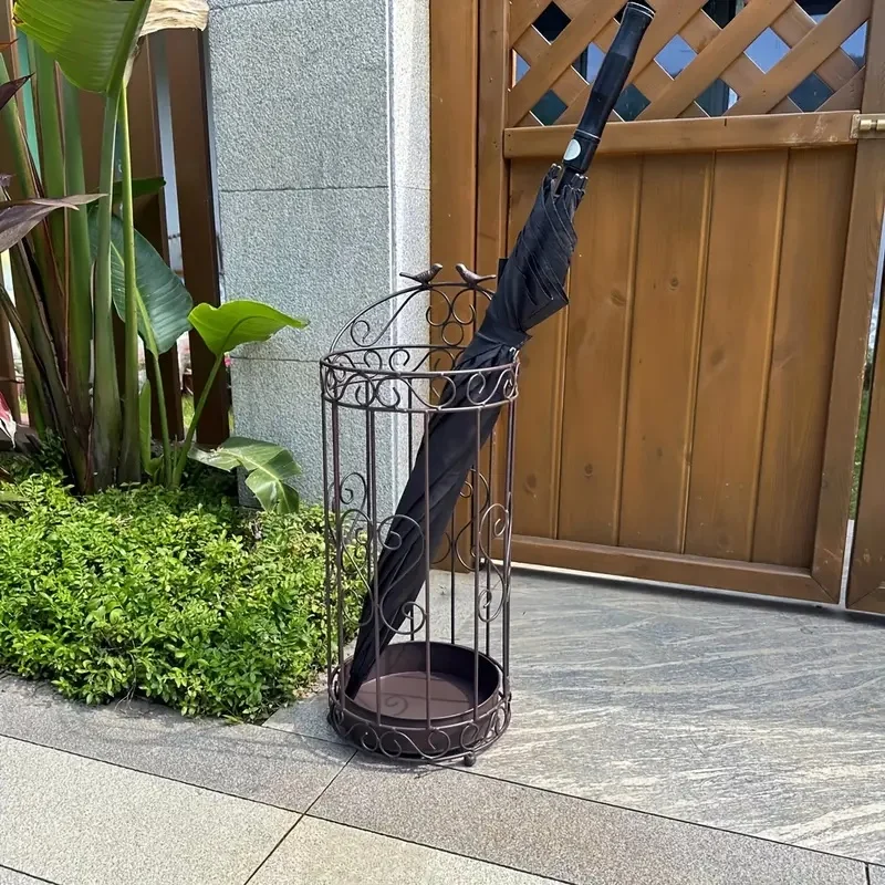 Space-Saving Umbrella Stand Conveniently stores multiple umbrellas and rain gear at home or office