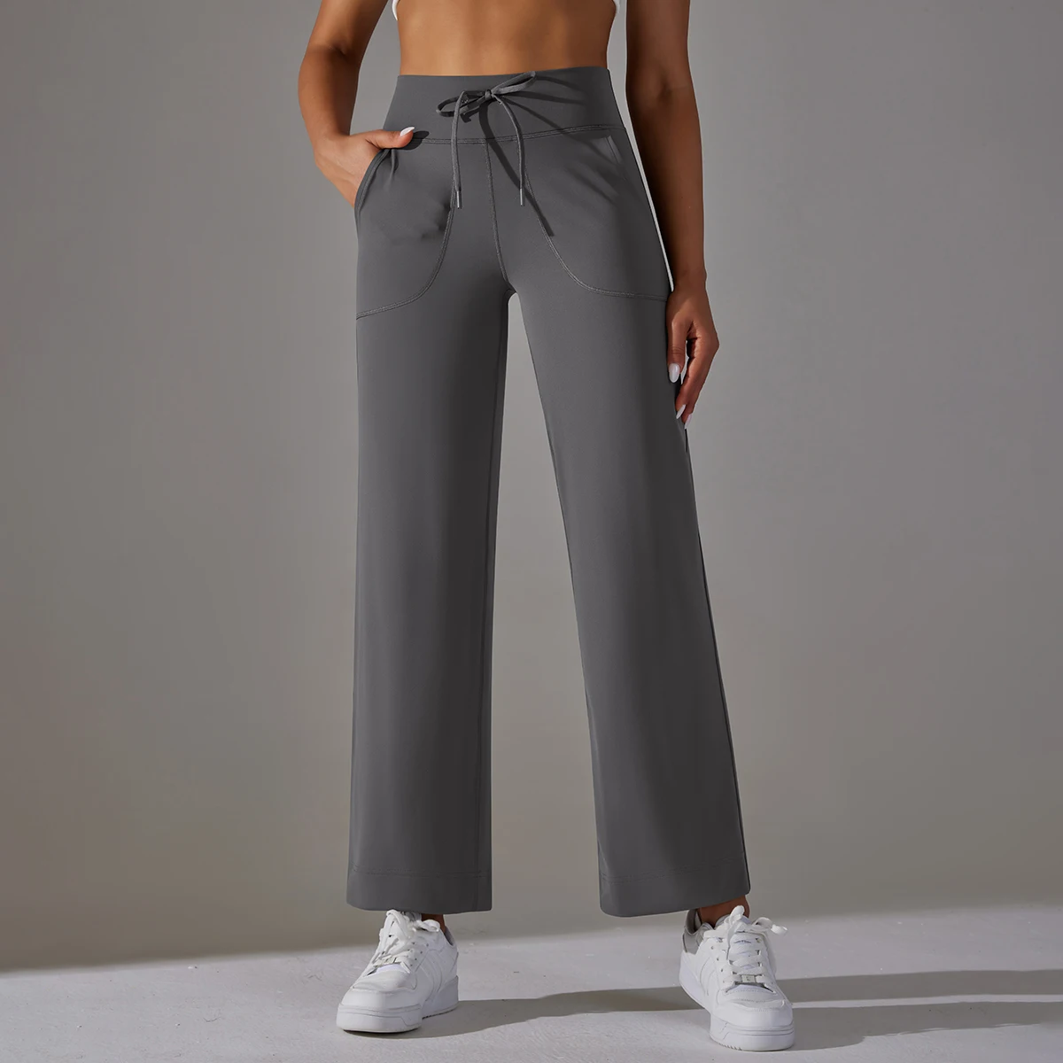 New Women′s Drawstring Waist Sweat Pants Yoga Apparel for Wholesale, Plain  Running Tight Athletic Wear Active Leggings Exercise Trousers with Side  Pockets - China Womens Sweat Pants and Workout Leggings price |