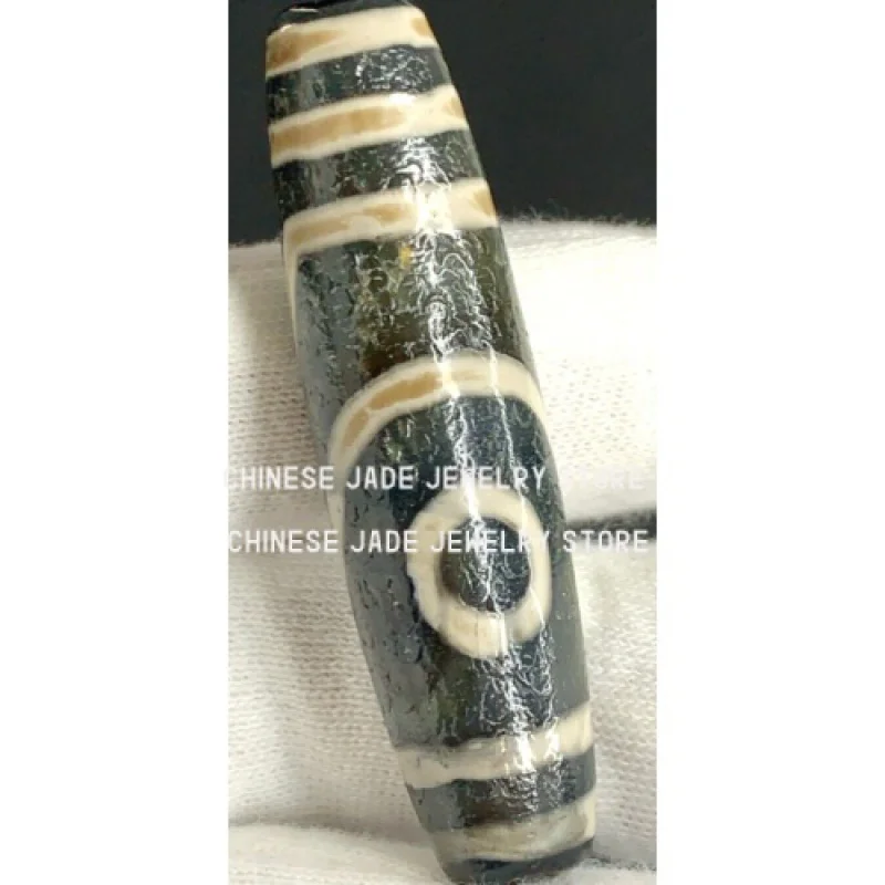 

Tibetan Old Agate Dzi Bead '2 Eyes' Amulet Fan 55.5mm x 14mm