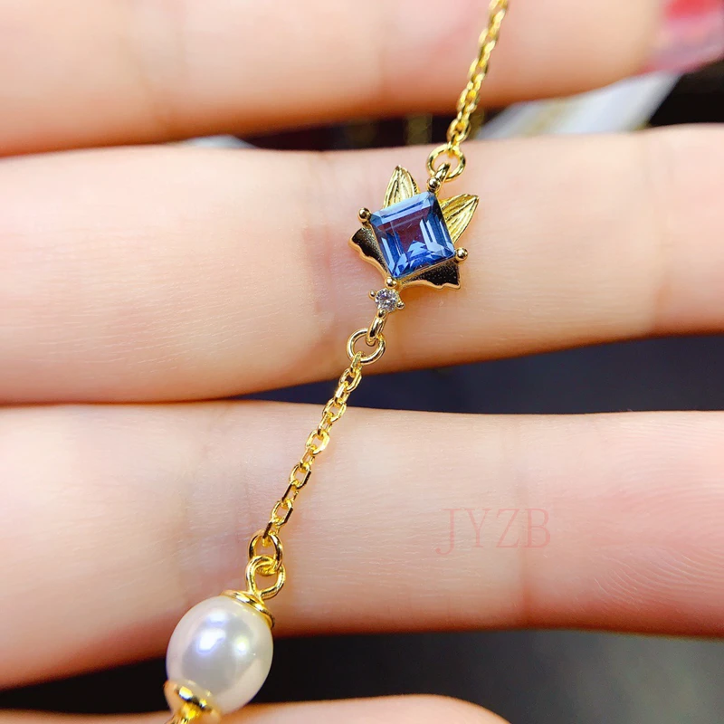 

Женский браслет из серебра 925 пробы с голубым топазом