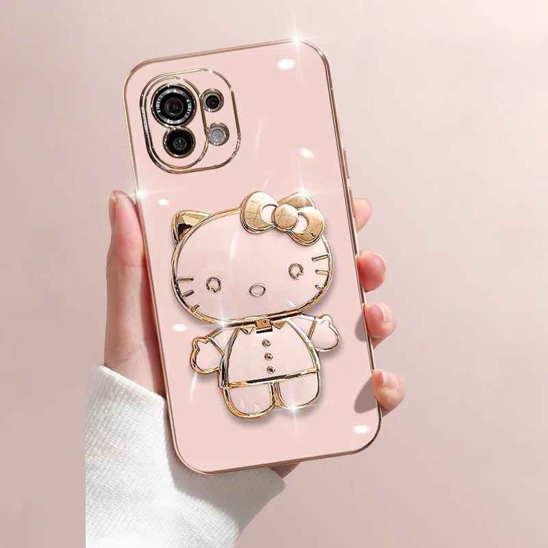 thumbnail image 1 of Funda con soporte de espejo Hello Kitty para Xiaomi Redmi Note 12, 4G, 5G, Turbo Plus, 12S, 11, 11S, 10, 9, 9S, 8 Pro, 12C, 10C, 10X, 9A, 9C, 1 of 5