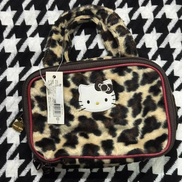 Hello Kitty cheetah print bag -definitely has a bit... - Depop