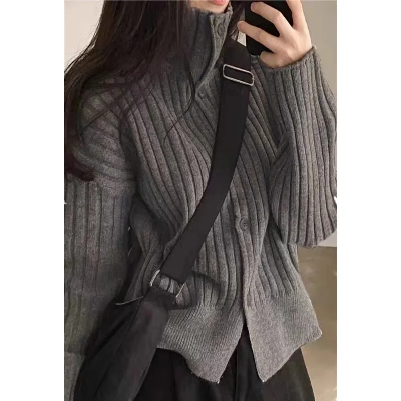 Autumn and winter turtleneck pit strip cashmere knit cardigan women thickened small pure wool sweater loose short coat tide