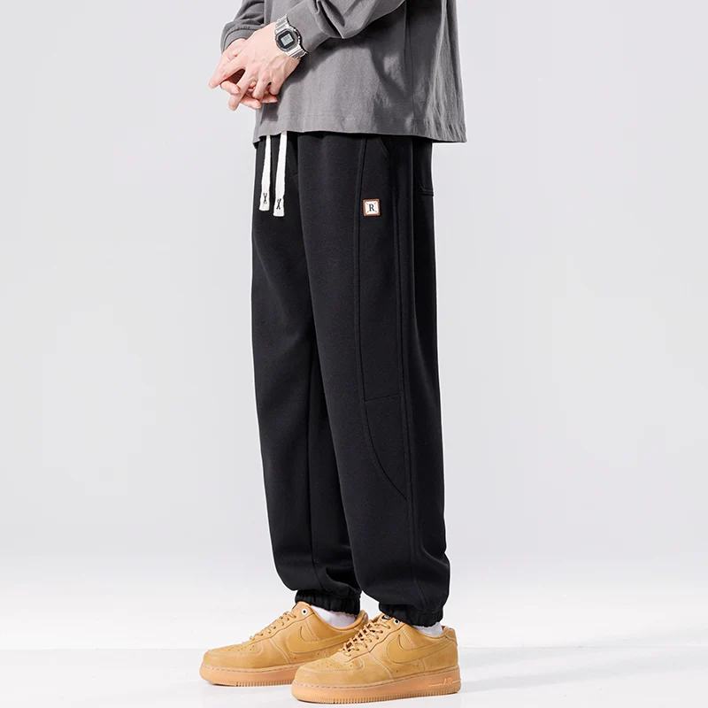 Spring Autumn New Solid Color Fashion Elastic Waist Sweatpants Man High Street Casual Loose Pockets Drawstring Cotton Trousers