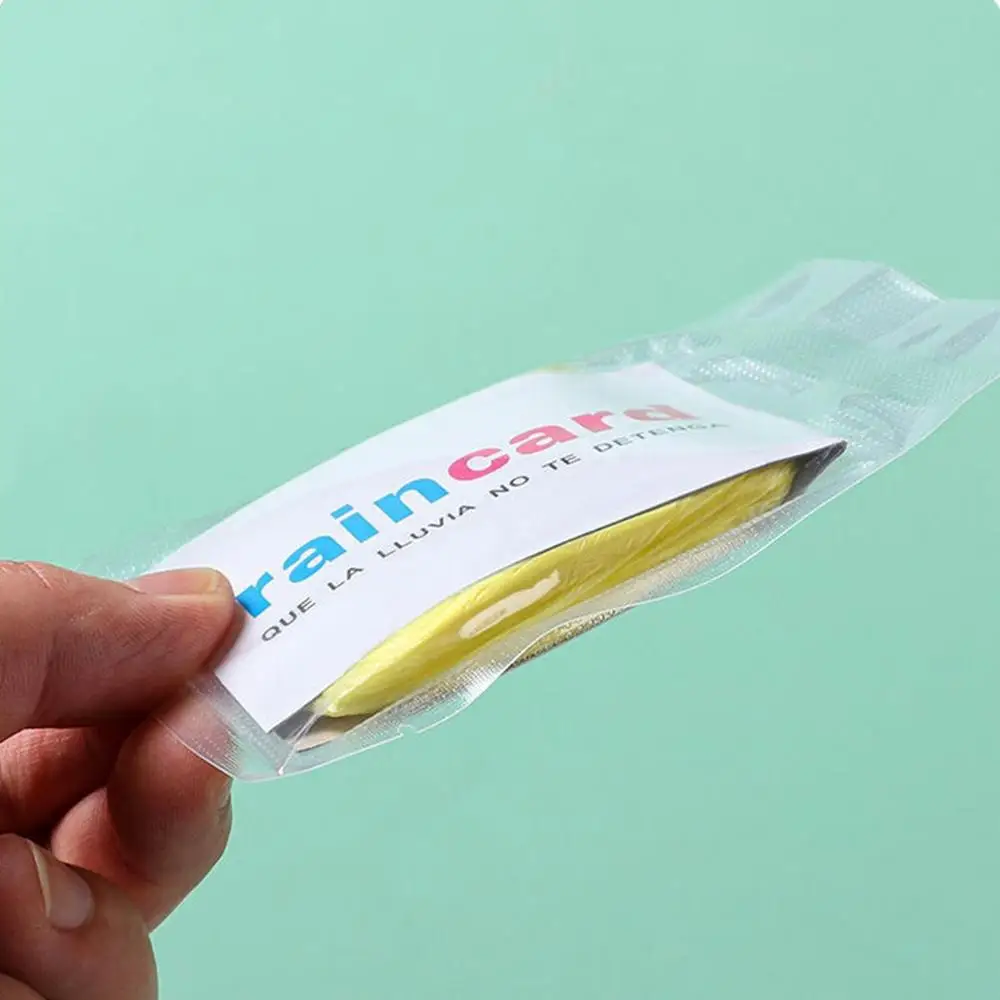 Description Picture 5 of item1/5pcs Disposable Raincoat Card Adult Portable Compression Hooded Raincoat Waterproof Ponchos Outdoor Travel Rafting Rain Cover