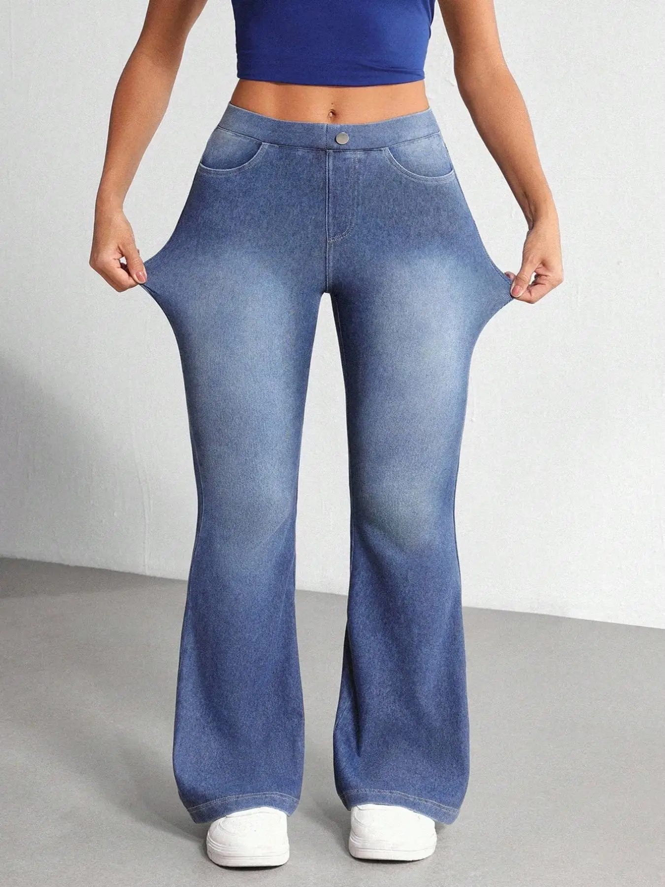 Jean bootcut taille haute extensible dans les quatre sens, grande taille, en denim doux avec effet ventre plat