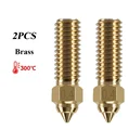 2x one hole brass