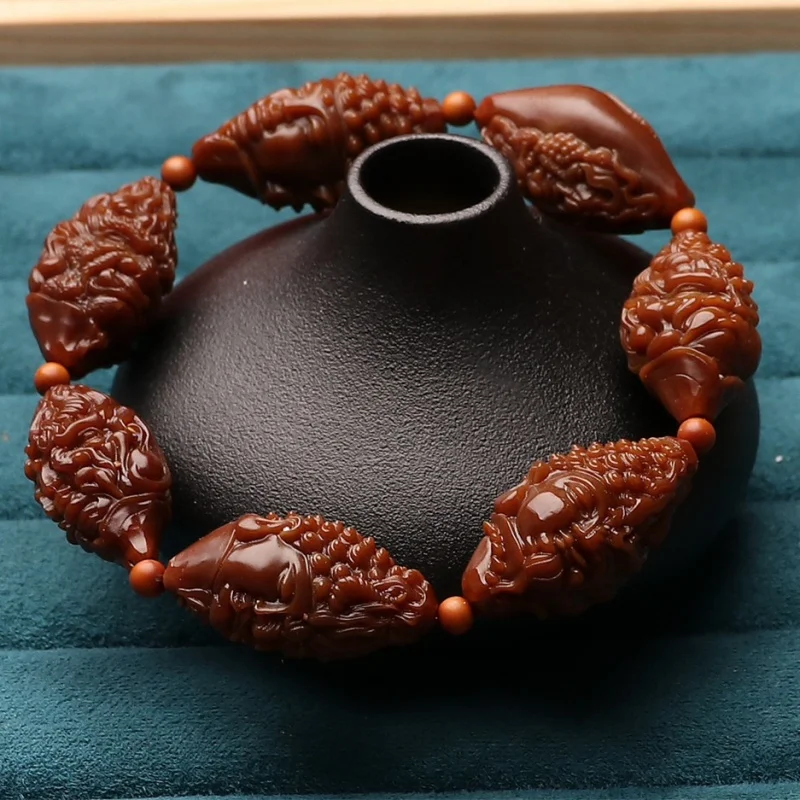 

Olive Nut Jadified Material Hand Carved a Flash of Thought Stone Carving Single Ring Bracelet