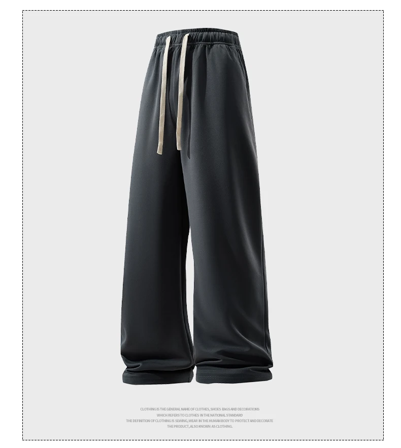 Man wearing loose wide-leg sweatpants with drawstring waist in a casual autumn streetwear setting black 06