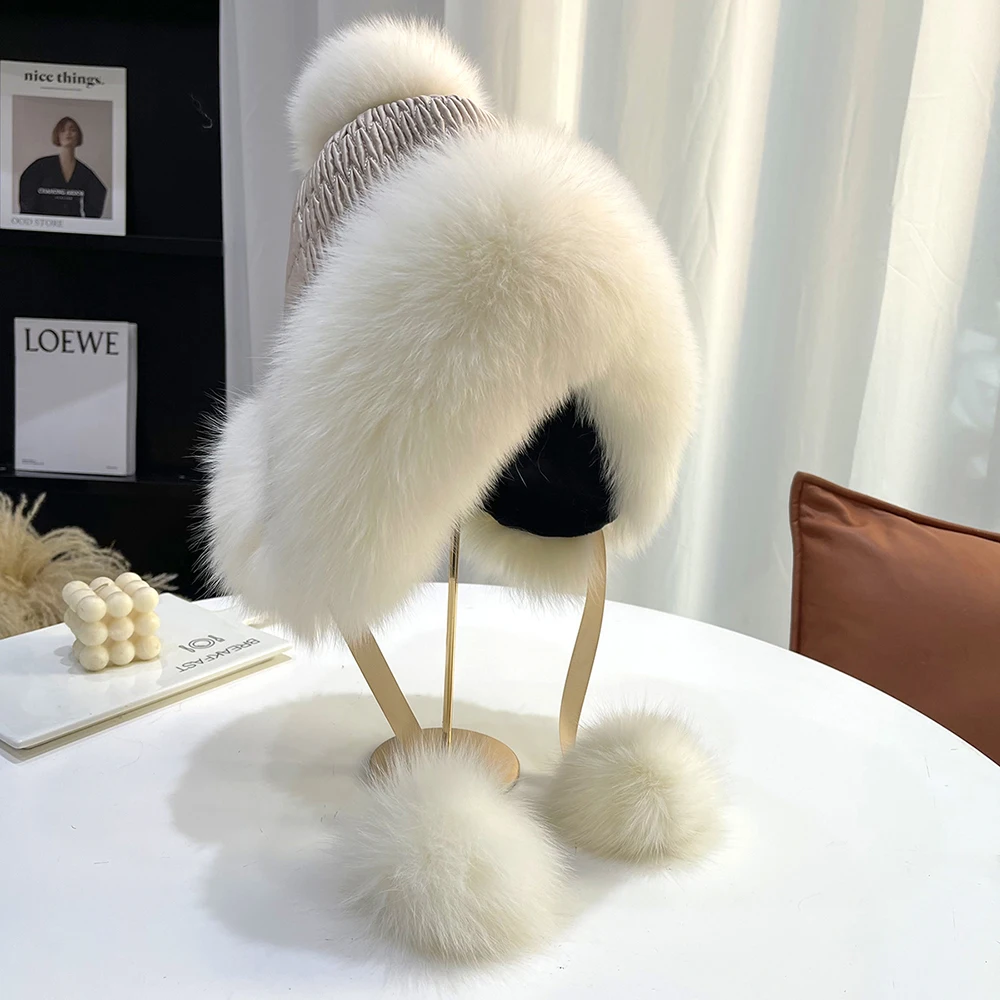 Fur pompoms for hats made of natural fox and raccoon fur