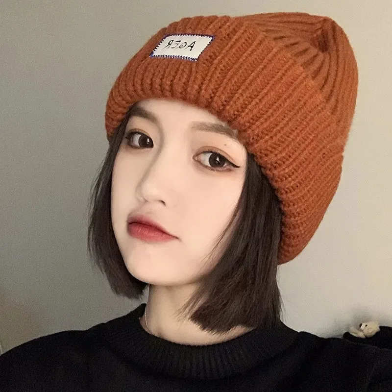

2022 Winter New Ski Hats Outdoor Riding Snowboard Caps Women's Knitted Caps Wool Dome Solid Color Windproof Warm Hiking Caps