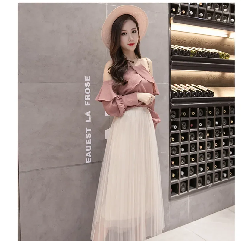 thumbnail image 1 of Falda acampanada versátil y adelgazante, nueva falda de tul de longitud media para mujer de estilo 2024, diseño de moda universal para las cuatro estaciones, 1 of 5