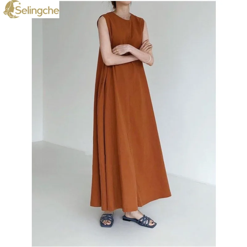 

Korean Version Round Neck Loose Solid Color Casual Large Hem Sleeveless Long Cotton and Linen Dress with a Lazy Style