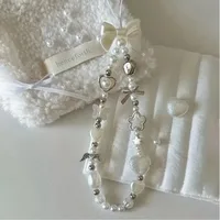 Lanière à breloques en chaîne de téléphone perlée pour iPhone Samsung, joli nœud blanc baroque, breloque en forme de fleur, accessoires universels, pendentif de bijoux 4