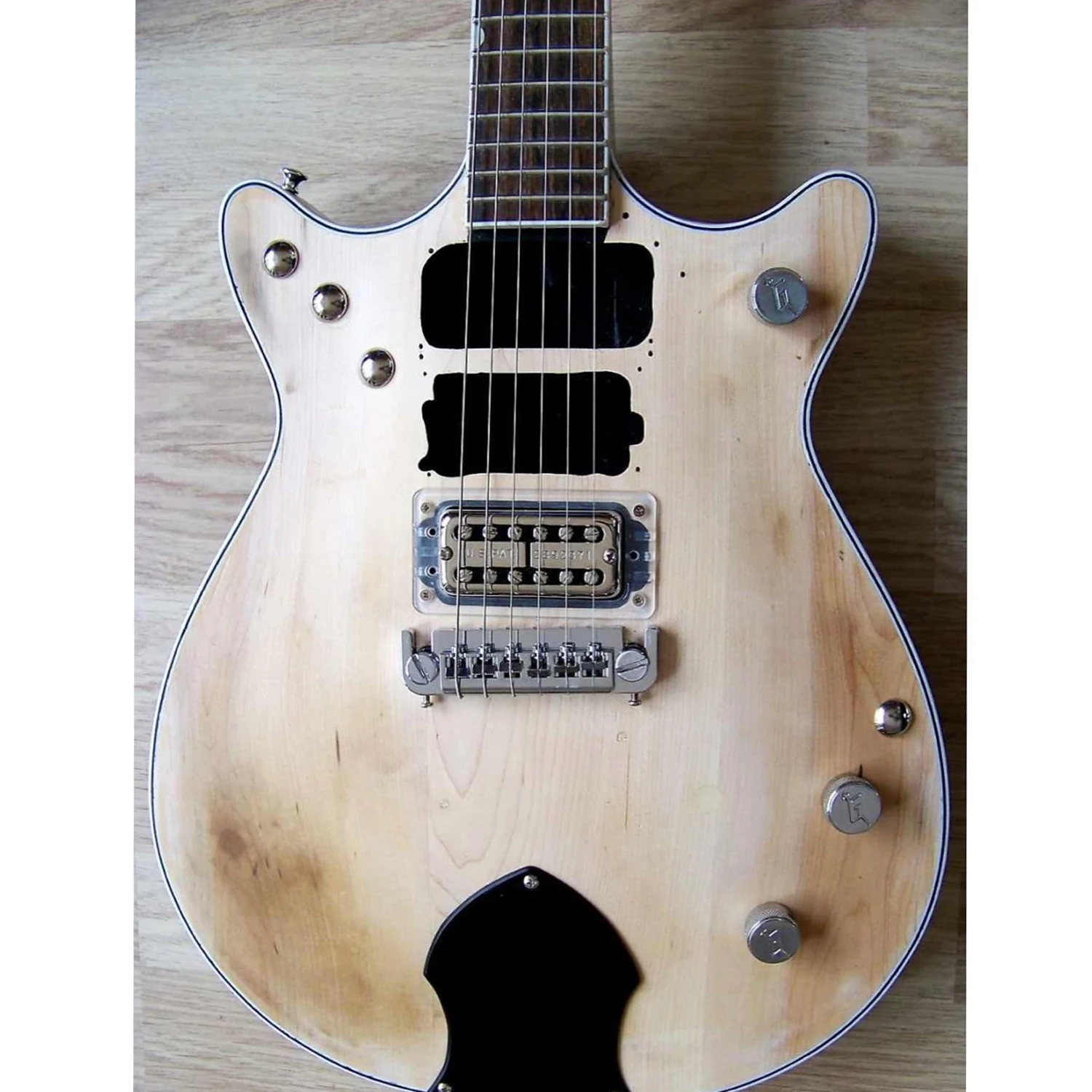 electric guitar mahogany body and neck ebony fingerboard plain maple board top chrome parts