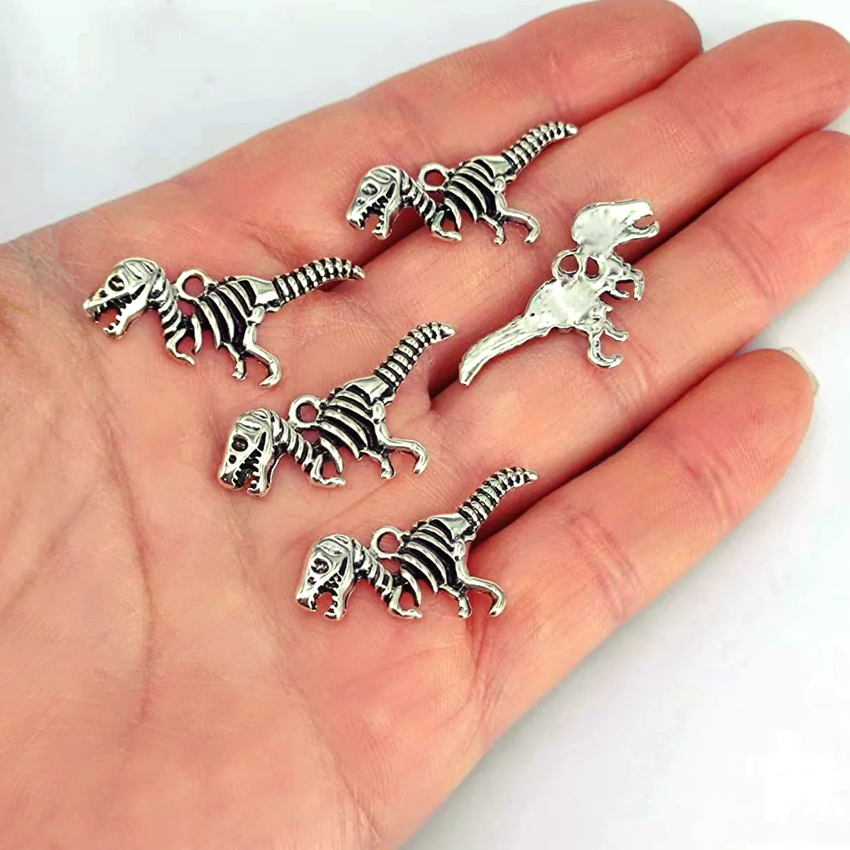

50pcs free shipping Cute Ancient Silver Dinosaur Skeleton charm for DIY