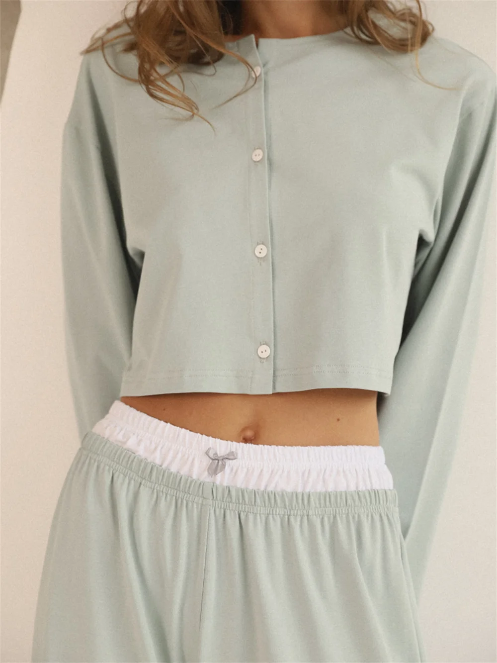 Long sleeve pajama set with button-front cardigan top, full-length pants, and cozy lounge fit