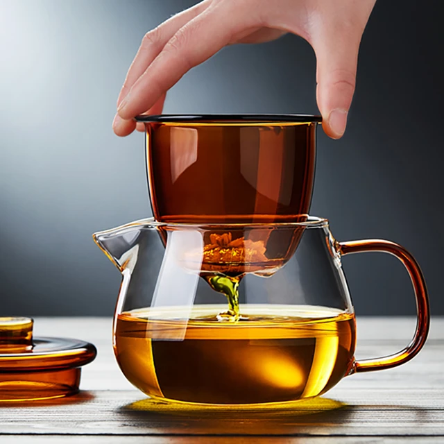 Premium Photo  Cup of hot tea and teapot on a serving tray