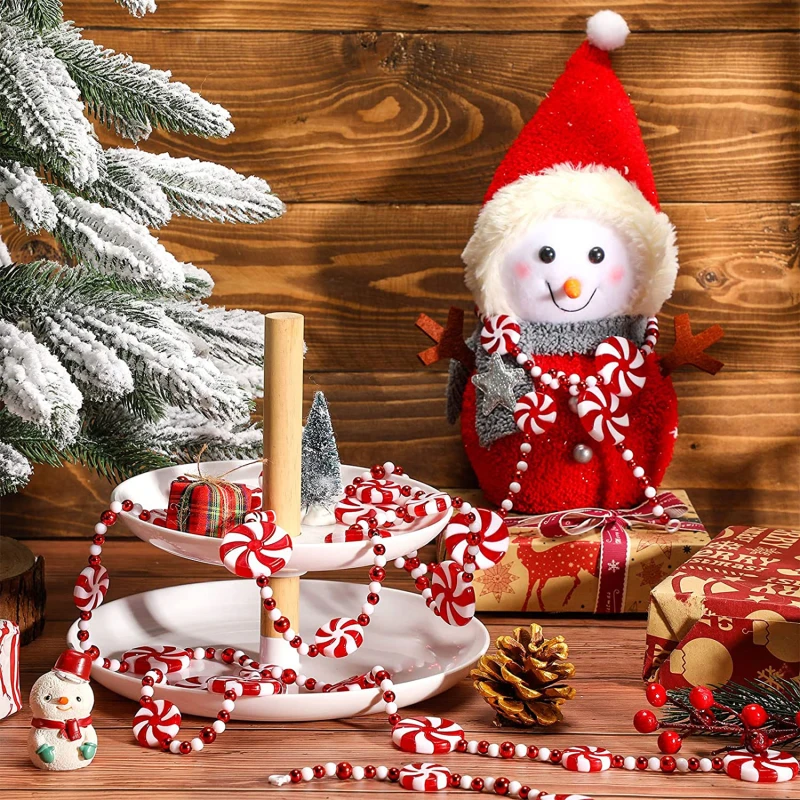 

Конфетная нить, искусственная кисточка, украшение из бисера, два искусственных конфет, украшение в виде тростника, фотоподарок