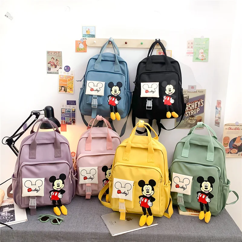 

Student backpack female cute Mickey Mouse junior high school campus school bag large capacity multi-purpose laptop bag Mommy bag