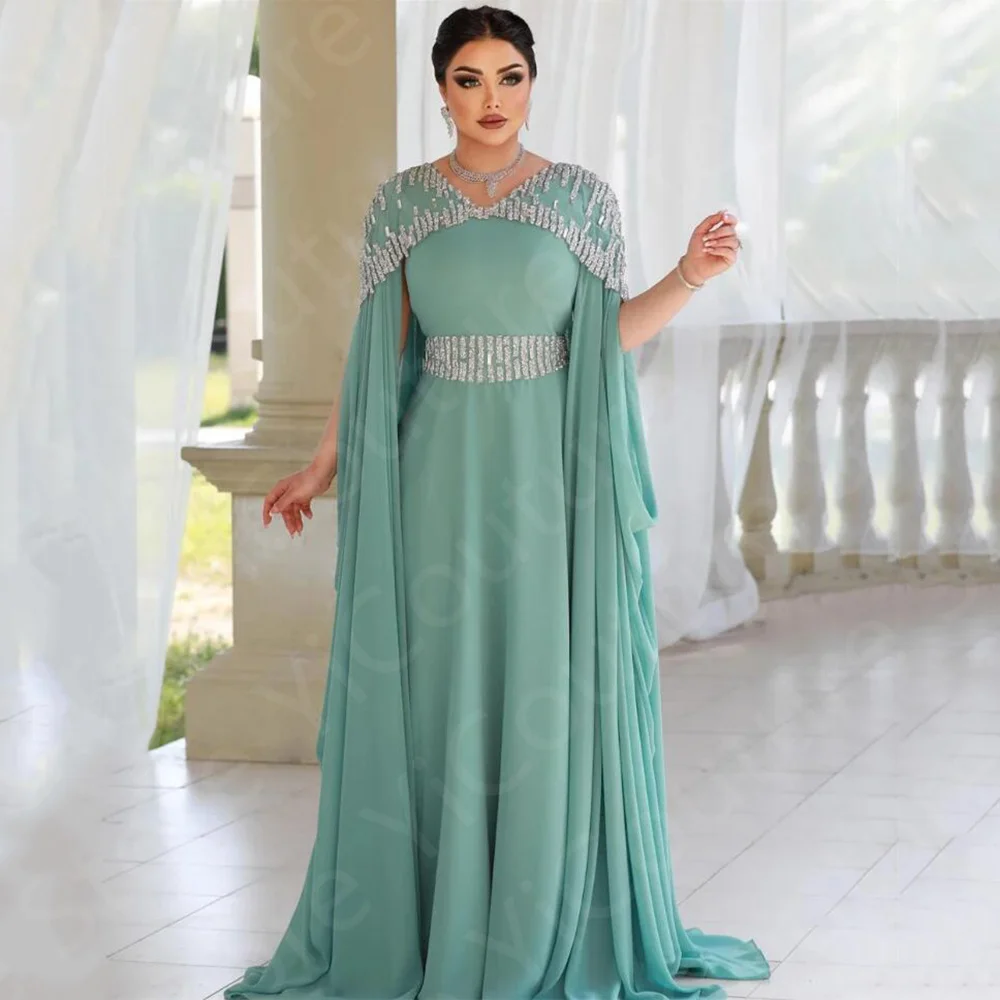 

Charming Saudi Arabic Muslim Dress Blue Prom Dresses Short Sleeves Beaded Evening Gowns V Neckline Wedding Party Dress 2024