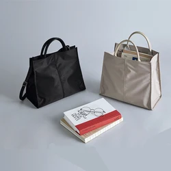 2022 Simple Nylon Business Briefcase Female Ol Lightweight Waterproof Handbag Student Shoulder Slung Atmospheric shoulder bag