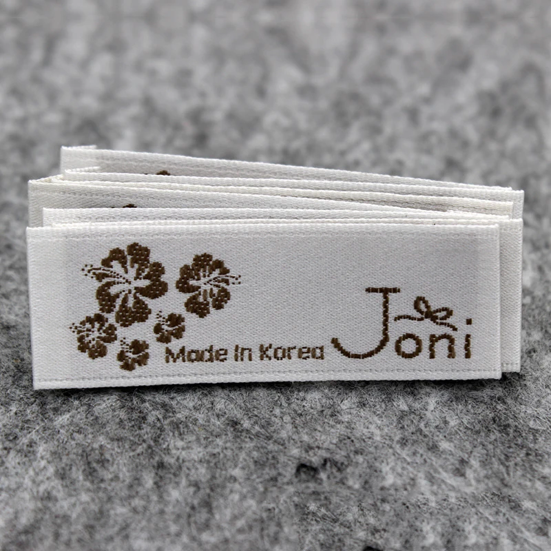 맞춤 의류 라벨, 맞춤형 직조 태그, 로고 브랜드 이름이 있는 금색 금속사 직조 라벨
