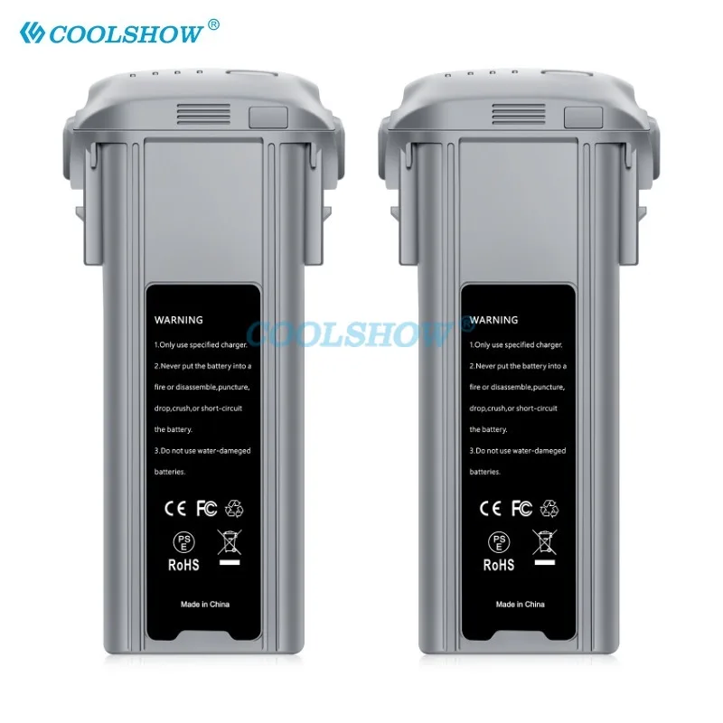 Lot de quatre batteries DJI alignées, avec chargeur - Achetez votre drone DJI pas cher lot batterie et chargeur inclus.
