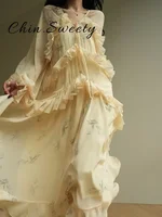 Robe longue élégante à volants imprimés pour femmes, à lacets, col en V, manches longues, coupe trapèze, robes de rue tendance du début du printemps 2026 2