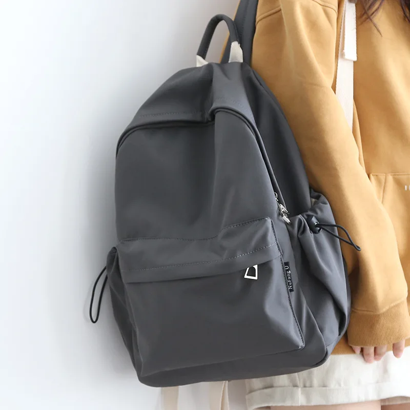 2024 New All-in-one Simple Solid Color Backpack Female Fashion Casual Male Schoolbag Large Capacity Travel Bag Wholesale
