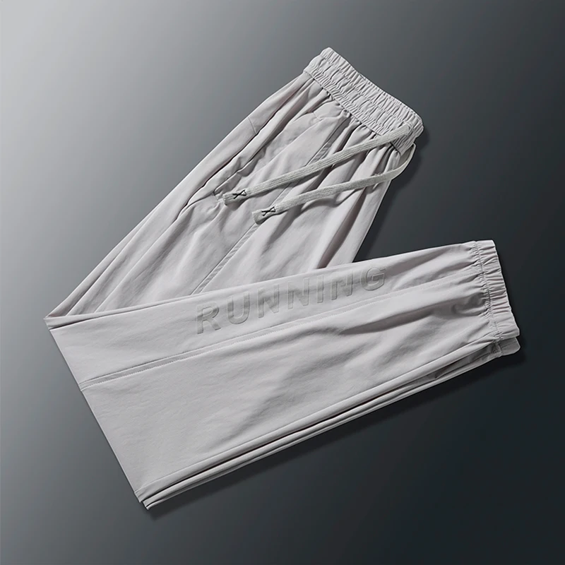 Summer Thin Ice Silk Quick Drying Couple Pants Comfortable Loose High Elasticity Sports Running Oversized Straight Leg Pants casual sports pants
