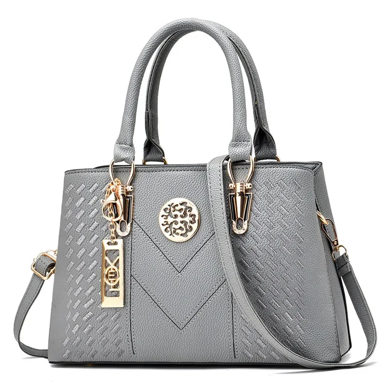 thumbnail image 1 of Bolso bandolera pequeño y elegante de cuero para mujer, bolso clásico para el viaje diario, 1 of 5
