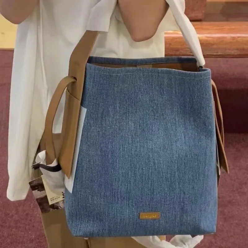 

Songmont 2024 New Shoulder Bag Hanging Ear Tote Luxury Brand Designer Denim Leather Commuter Leisure Diagonal Women's Bag
